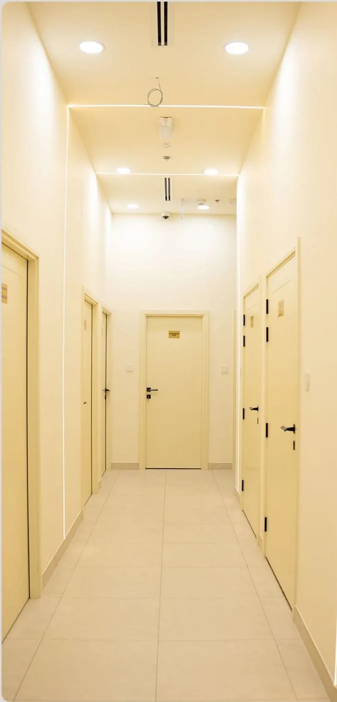 Internal hallway of Aafiyah Care Clinic Dubai connecting consultation and treatment rooms