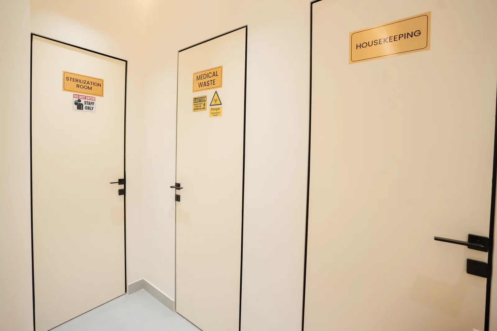 Clearly labelled sterilization, medical waste and housekeeping support rooms