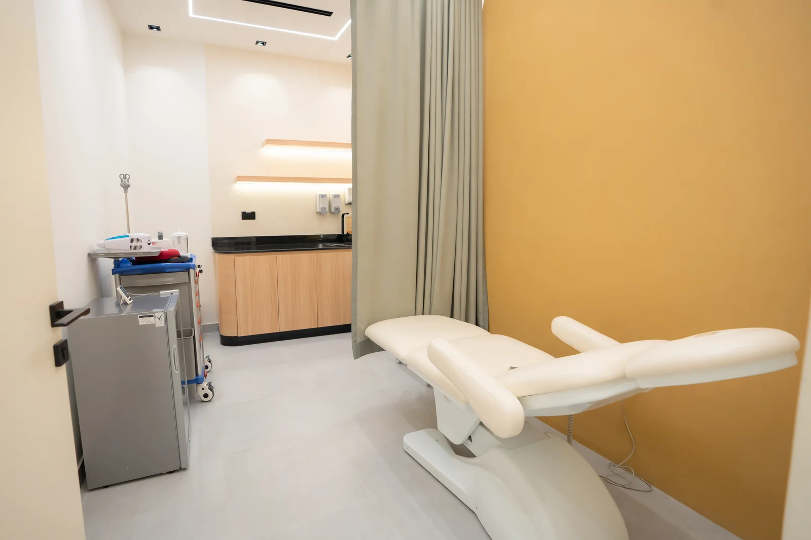 Finished treatment room with clinical worktop and equipment